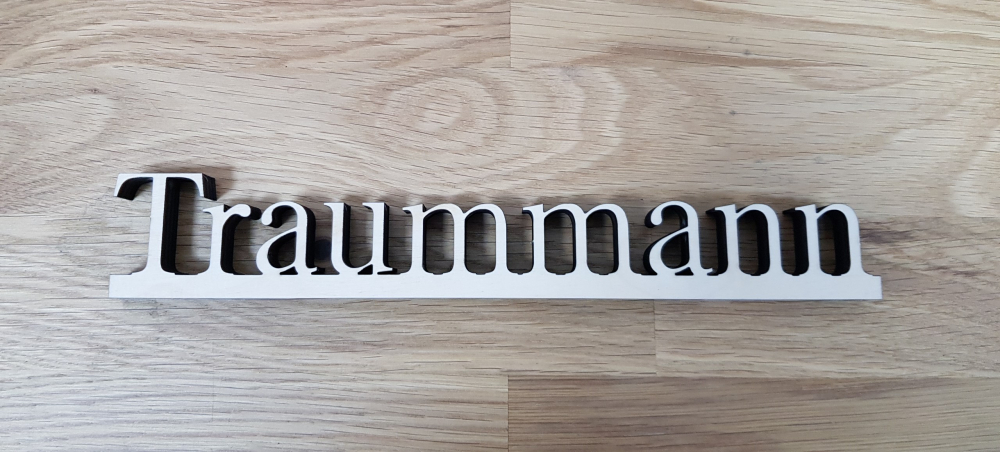 Holzschriftzug "TRAUMMANN"